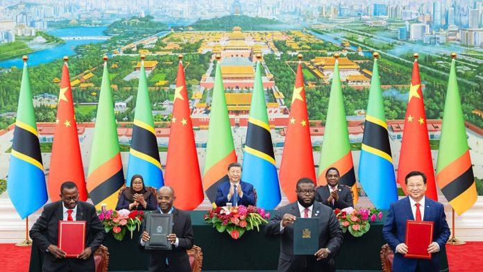 Chinese President Xi Jinping, Tanzanian President Samia Suluhu Hassan and Zambian President Hakainde Hichilema in the Great hall of the People, Beijing
