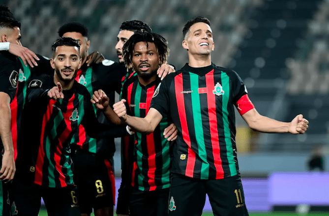 AS FAR's Ahmed Hammoudan celebrates goal with teammates.