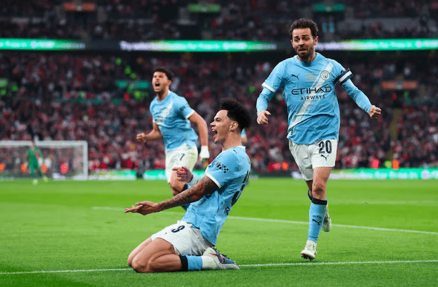 Manchester City's ​Nico O'Reilly celebrates goal.