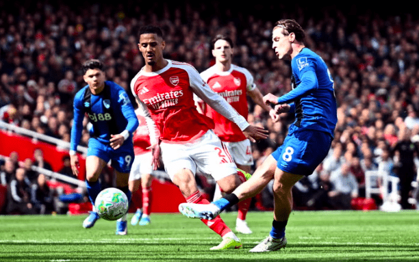 Alex Scott scores goal.