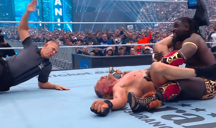 Nigerian Wrestler Oba Femi Defeats Brock Lesnar