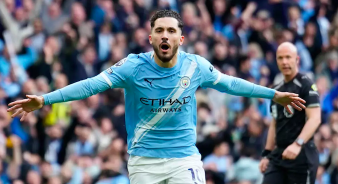 Manchester City's Rayan Cherki celebrates goal.
