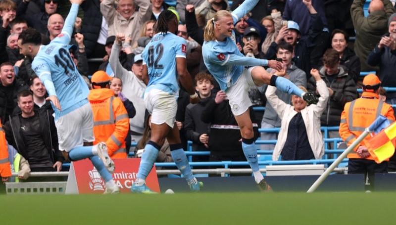 Norwegian striker Erling Haaland scores as Manchester City beat Liverpool 4-0 in the FA Cup semi-finals, at ​the Etihad Stadium in Manchester, England.