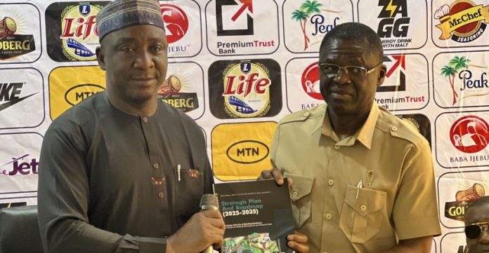 President of the Nigeria Football Federation (NFF), Ibrahim Musa Gusau (L), with the Director General of the National Institute for Sports (NIS), Philip Shaibu (R).