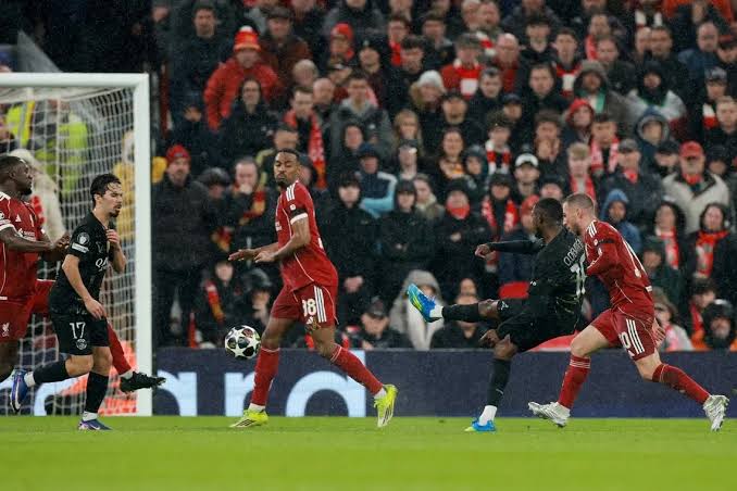 PSG forward Ousmane Dembele scores against Liverpool.