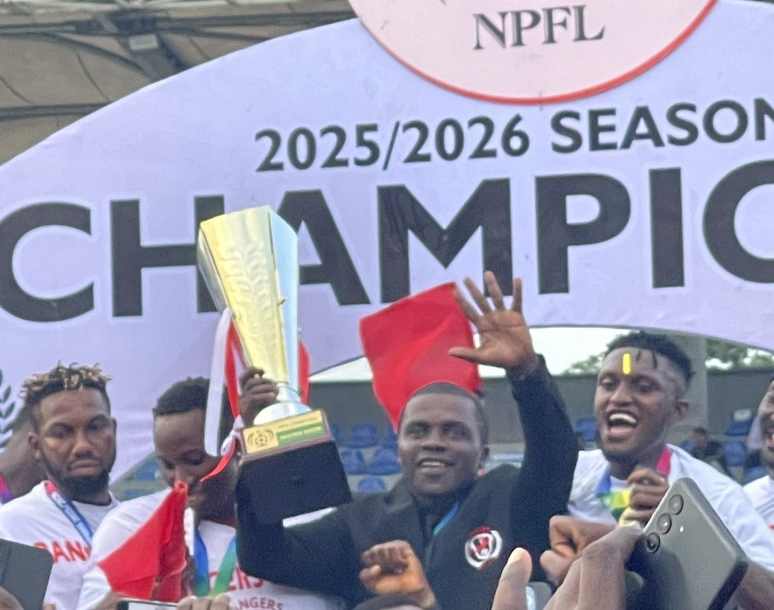 Rangers International Technical Adviser, Fidelis Ilechukwu, with NPFL trophy.