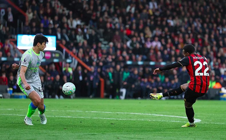 Bournemouth forward Eli Junior Kroupi scores goal.