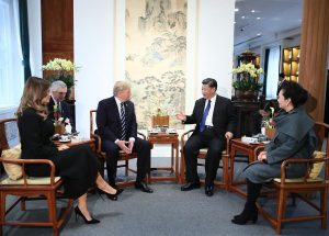 Chinese President Xi Jinping (3rd R) and his wife Peng Liyuan (1st R), and U.S. President Donald Trump (3rd L) and his wife Melania Trump (1st L)