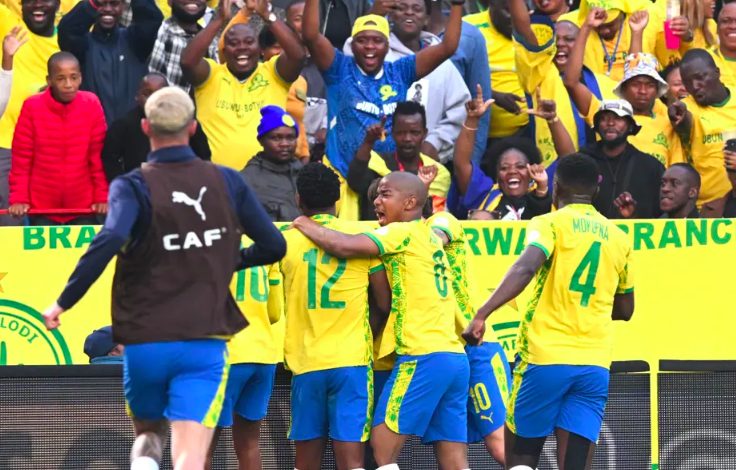 Mamelodi Sundowns' Aubrey Modiba celebrates goal with teammates, during CAF Champions League first-leg final against AS FAR, at the Loftus Versfeld Stadium in Pretoria, South Africa.