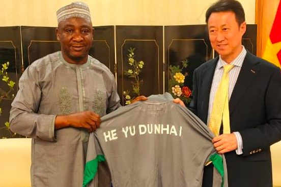 President of the Nigeria Football Federation (NFF), Ibrahim Musa Gusau (L) with Chinese Ambassador to Nigeria, Yu Dunhai (R).