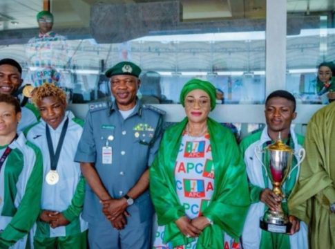 Nigeria's championship-winning wrestling team with First lady Sen. Remi Tinubu (C), National Sports Commission Chairman, Shehu Dikko (R) and Nigeria Wrestling Federation president and Customs boss, Bashir Adewale Adeniyi.