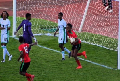 Malawi U-20 players celebrate goal.