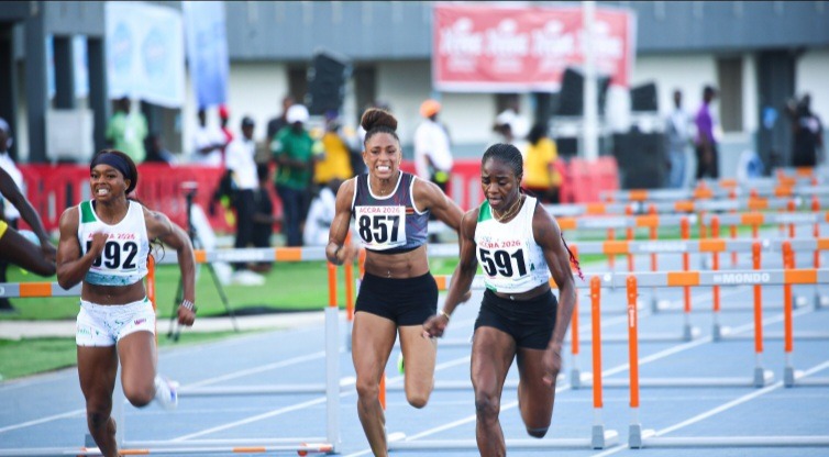 Image of Tobi Amusan with compatriot Adaobi Tabugbo competing at the Women's 100m Hurdles, event at the African Athletics Championships in Ghana.