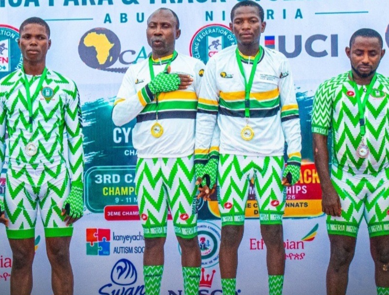 Team Nigeria cyclists on the podium at the 2026 CAC African Track Cycling Championship in Abuja, Nigeria.
