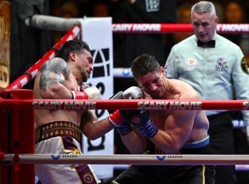 Action during WBC title fight between Ukraine’s Oleksandr Usyk (L) and Dutch former kickboxer, Rico Verhoeven (R).