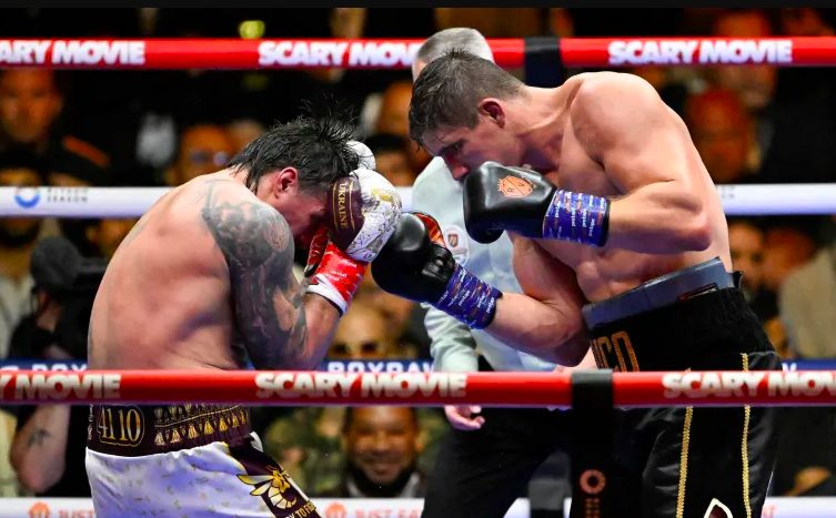Action during WBC title fight between Ukraine’s Oleksandr Usyk (L) and Dutch former kickboxer, Rico Verhoeven (R).