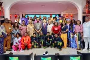 Participants and dignitaries pose for a group photograph during the 2026 China Tourism Day celebration in Abuja.