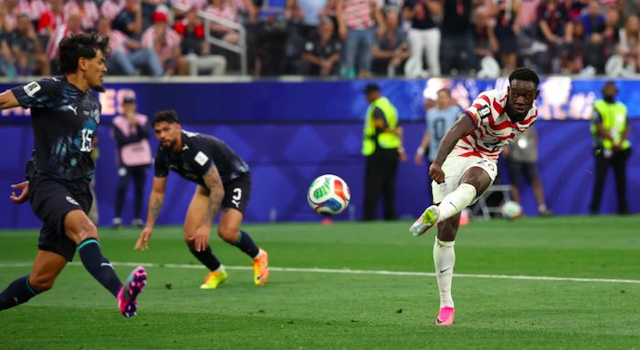 United States striker Folarin Balogun scores goal against Paraguay.