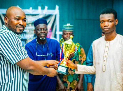 L-R: Sponsor Hon. Mubarak Bello; Executive Chairman, Kwara State Sports Commission, Bola Magaji; Vice Chairman, Kwara State Chess Association, AbdulRazaq Odofin; and winner Malik Idris Omidiji; during the Chess Tournament to celebrate 7th anniversary of Governor AbdulRahman AbdulRazaq in Ilorin, Kwara State, Nigeria.