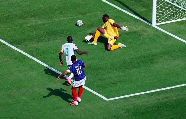 Frenchman Kylian Mbappe scores