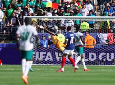 Frenchman Kylian Mbappe scores a powerful long-range strike past Senegal goalkeeper Mendy, during their FIFA World Cup encounter.