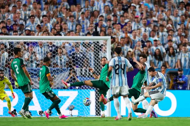 Lionel Messi scores third goal against Algeria.