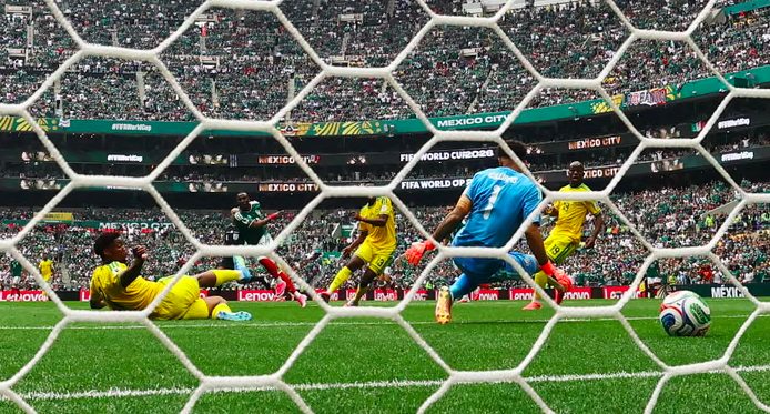 Mexico's Julian Quinones scores goal.