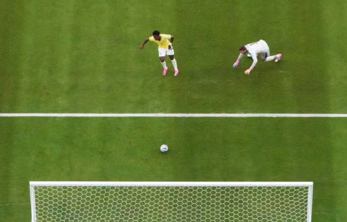 Brazil forward Vinicius Jr scores goal against Scotland.