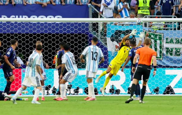 Cape Verde goalkeeper Vozinha saves Lionel Messi's free-kick.