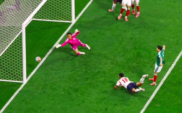 England's Jude Bellingham scores diving header.