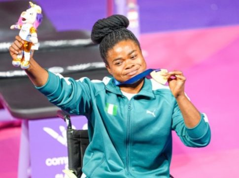 Nigerian para-powerlifter, Esther Nwogu, on the podium at the 2026 Commonwealth Games in Glasgow, Scotland.