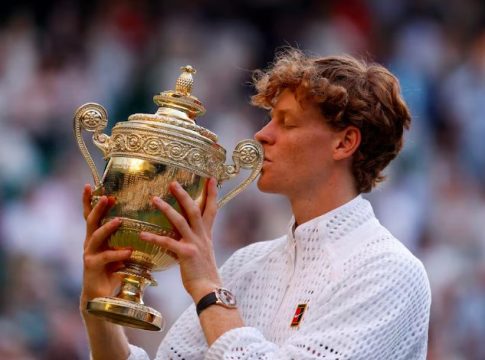 Italy's Jannik Sinner with the Wimbledon title