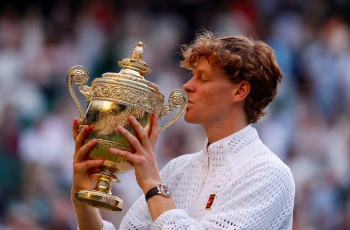 Italy's Jannik Sinner with the Wimbledon title