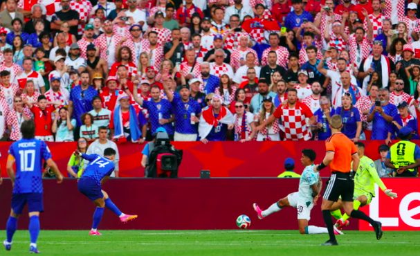 Defender Ivan Perisic scores for Croatia