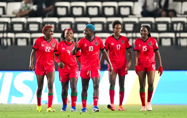 Malawi's senior women's football team celebrates goal against Nigeria, during WAFCON2