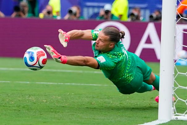 Norway goalkeeper Orjan Nyland saves penalty