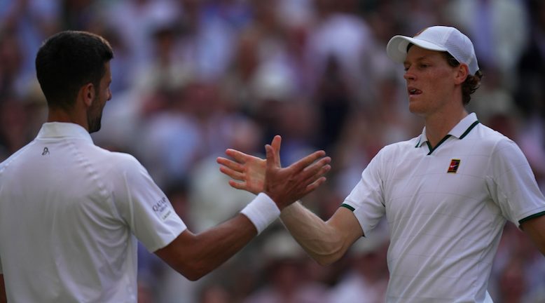 Novak Djokovic (L) with Jannik Sinner (R)