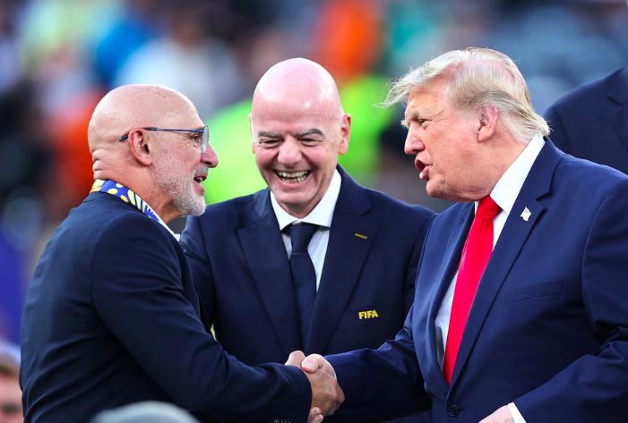 Spain coach Luis De La Fuente shakes hands with U.S. President Donald Trump after winning the World Cup as FIFA President Gianni Infantino looks on