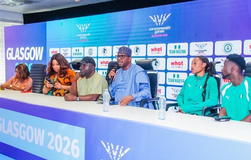Chairman of the National Sports Commission (NSC), Shehu Dikko (C) speaks.