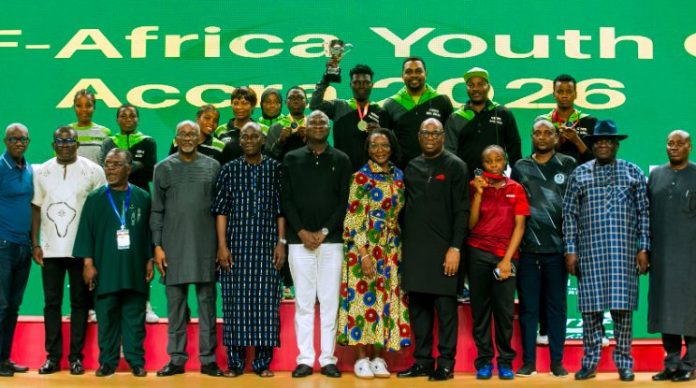 Former Governor of Nigeria's Lagos State, Babatunde Raji Fashola (C), with Team Nigeria participants at the 2026 ITTF Africa Youth Cup in Accra, Ghana.