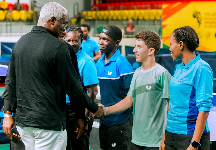 Former Governor of Nigeria's Lagos State, Babatunde Raji Fashola shakes participants at 2026 ITTF Africa Youth Cup.