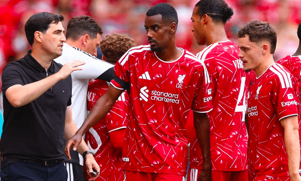 Liverpool head coach, Andoni Iraola with players.