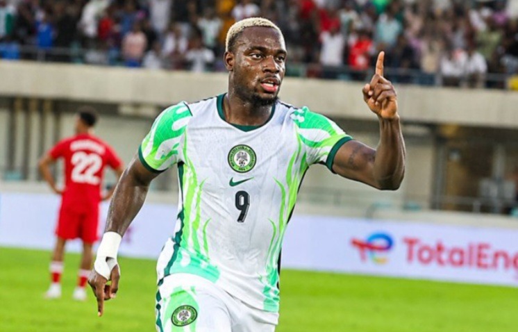 Super Eagles' George Ilenikhena celebrates.