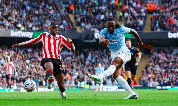 Manchester City's Antoine Semenyo scores