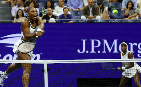 Serena and Venus Williams in action at the US Open.